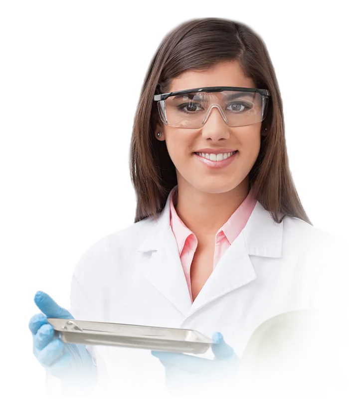 Photo of female Dentist holding equipment